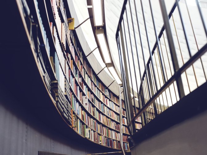 Library with a rounded wall full of books